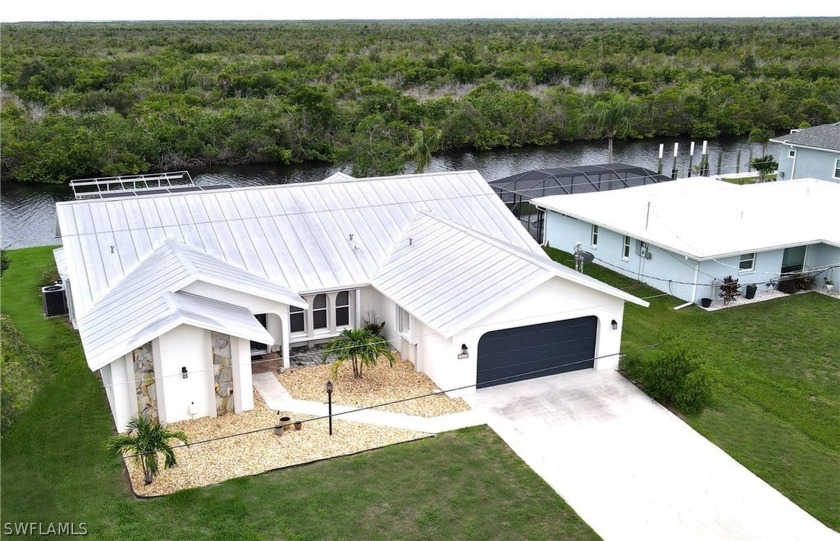 **PLEASE ENJOY THE 3D INTERACTIVE VIRTUAL TOUR ASSOCIATED WITH - Beach Home for sale in Port Charlotte, Florida on Beachhouse.com