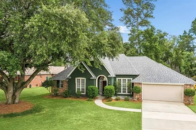 Welcome to 1332 S Ridge Dr, a lovely home located in the - Beach Home for sale in Mandeville, Louisiana on Beachhouse.com