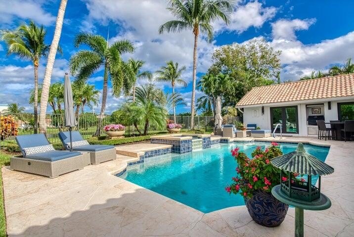 Welcome to this exquisite five-bedroom, four-bathroom residence - Beach Home for sale in West Palm Beach, Florida on Beachhouse.com