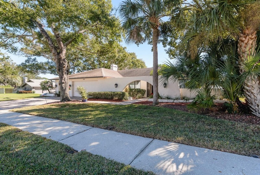 Don't wait until the new year to tour this beloved split - Beach Home for sale in Clearwater, Florida on Beachhouse.com