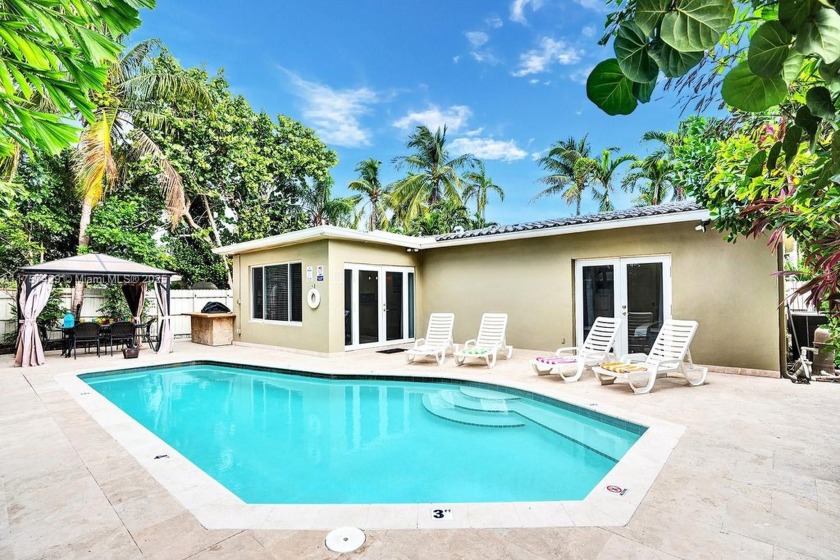 This beautifully upgraded 4-bedroom, 2-bath home is just minutes - Beach Home for sale in Hollywood, Florida on Beachhouse.com