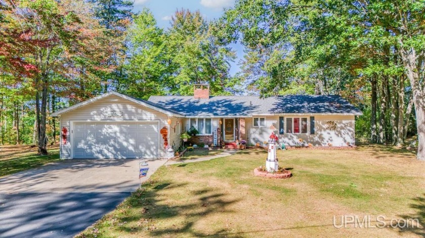 Experience year-round waterfront bliss on Little Bay De Noc with - Beach Home for sale in Rapid River, Michigan on Beachhouse.com