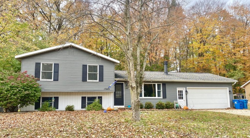 Welcome to the very desirable location of Bayberry Drive! This - Beach Home for sale in Spring Lake, Michigan on Beachhouse.com