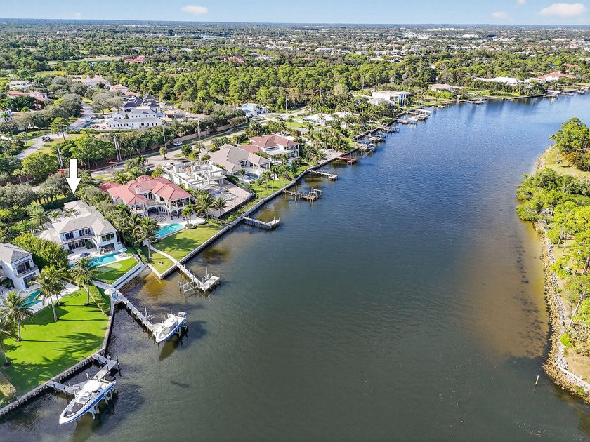 Set behind the gates of an intimate waterfront enclave, this - Beach Home for sale in Palm Beach Gardens, Florida on Beachhouse.com
