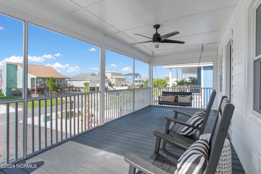 Beautiful MARSHFRONT home on Oak Island. This 3-bedroom - Beach Home for sale in Oak Island, North Carolina on Beachhouse.com