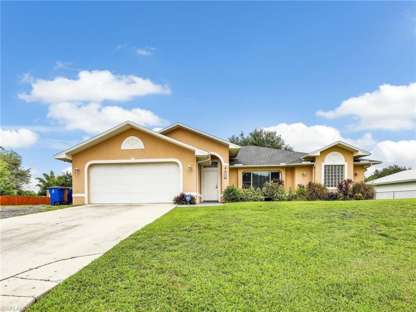 Welcome to this spacious canal home on a fully fenced oversized - Beach Home for sale in Fort Myers, Florida on Beachhouse.com