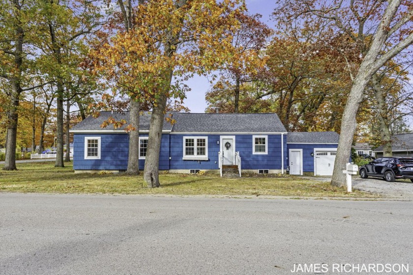 Welcome home to this beautiful 3-bed, 1.5-bath gem! Step inside - Beach Home for sale in Spring Lake, Michigan on Beachhouse.com