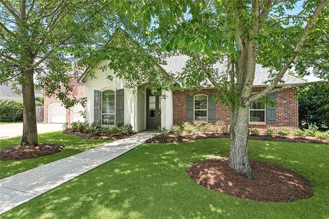 This lovely home in the popular Mandeville community of Beau - Beach Home for sale in Mandeville, Louisiana on Beachhouse.com