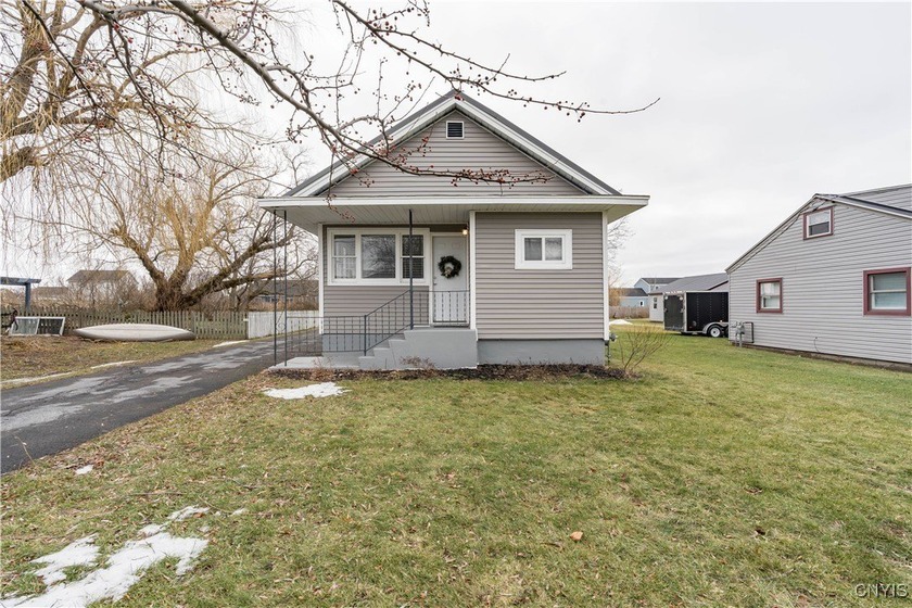 Welcome to 214 Dodge Avenue, a charming one-level home in the - Beach Home for sale in Sackets Harbor, New York on Beachhouse.com