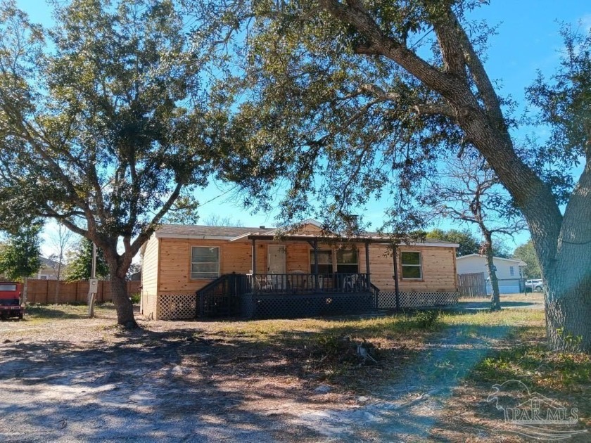 Location..Location...Location. Charming Three bedroom /two bath - Beach Home for sale in Gulf Breeze, Florida on Beachhouse.com