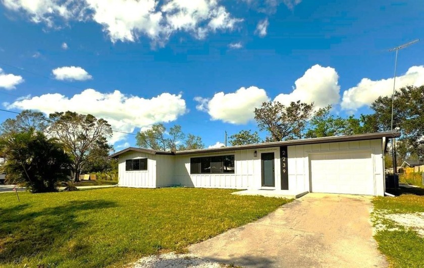 This charming one-story, corner-lot home in Sarasota is fully - Beach Home for sale in Sarasota, Florida on Beachhouse.com