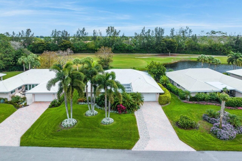 Shimmering lake and golf course views from this luxurious 3 - Beach Home for sale in Boynton Beach, Florida on Beachhouse.com
