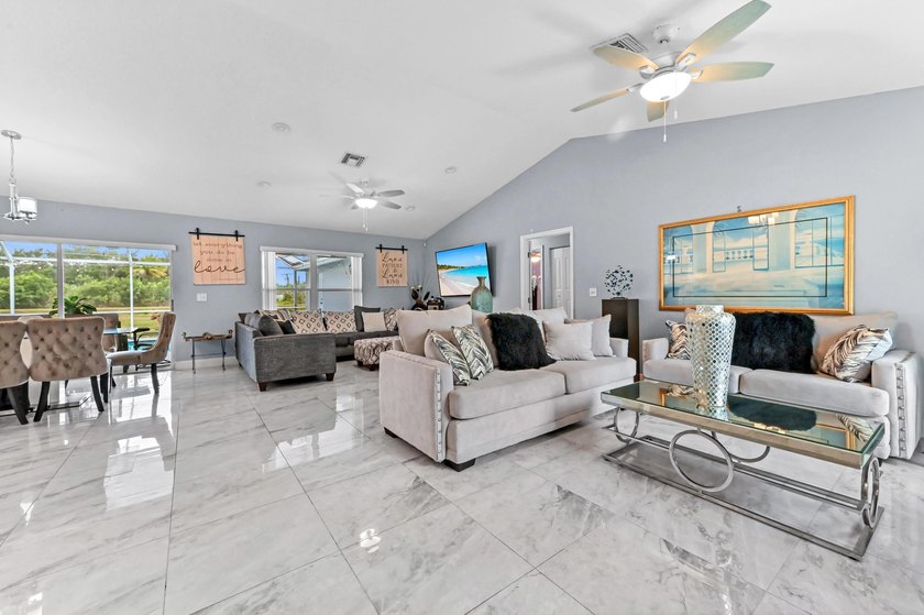 Step into a residence defined by volume and light, where soaring - Beach Home for sale in Boynton Beach, Florida on Beachhouse.com