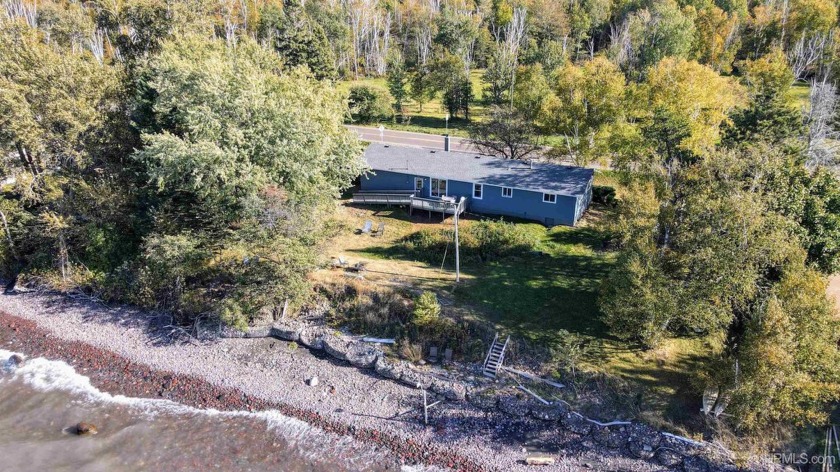 Lake Superior sunsets at there best! Three-bedroom, one bath, 2 - Beach Home for sale in Calumet, Michigan on Beachhouse.com