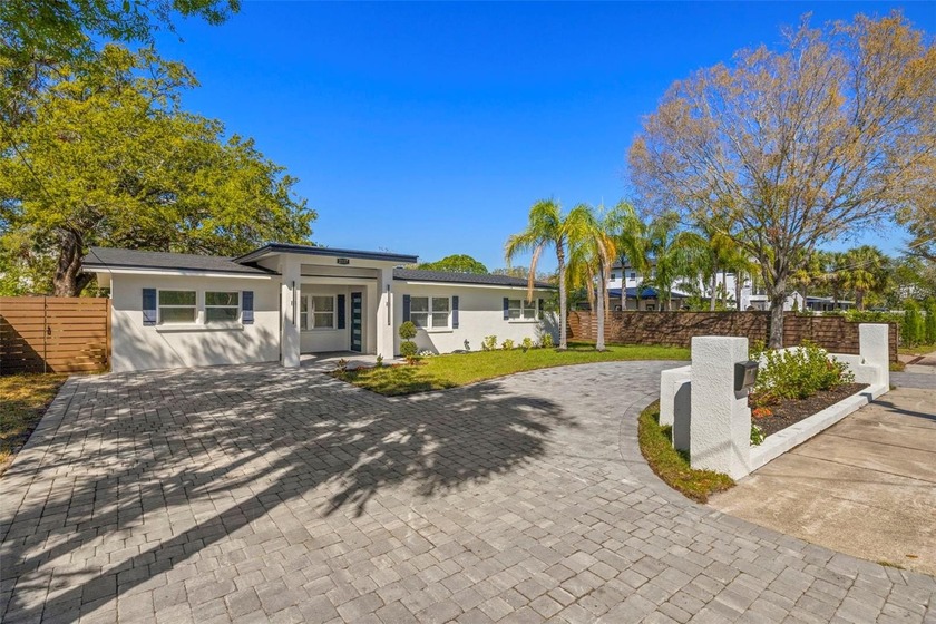 Welcome to this beautifully reimagined canal-front residence in - Beach Home for sale in Tampa, Florida on Beachhouse.com