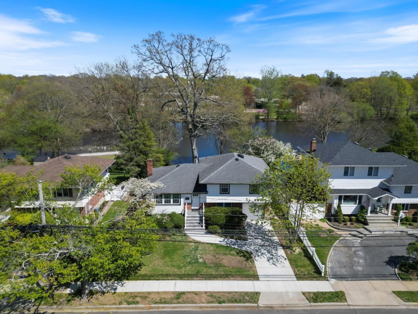 There are only a few Lake Front homes in this neighborhood - Beach Home for sale in Massapequa Park, New York on Beachhouse.com