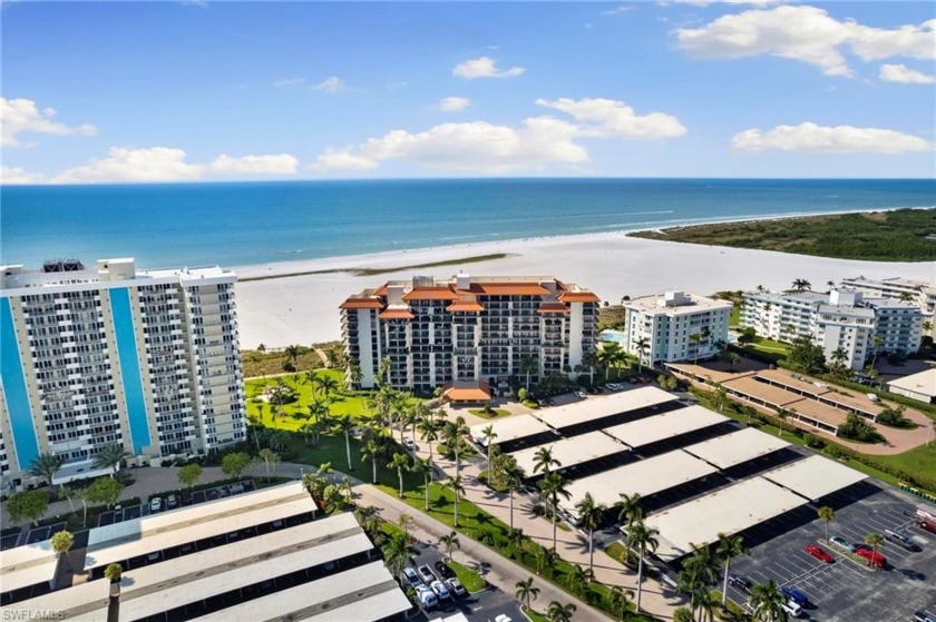 Experience the pinnacle of beachfront living at Tradewinds, an - Beach Condo for sale in Marco Island, Florida on Beachhouse.com