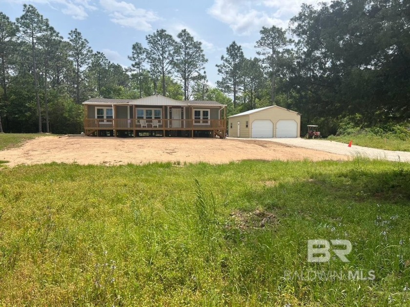 1.1 Acre Lot-Welcome to this quiet haven nestled in the heart of - Beach Home for sale in Lillian, Alabama on Beachhouse.com