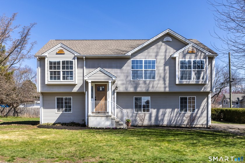 This beautifully updated 4-bedroom, 1.5-bath raised ranch sits - Beach Home for sale in Milford, Connecticut on Beachhouse.com