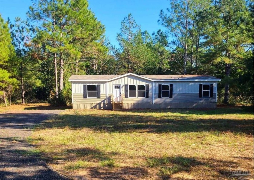 Escape to the tranquility of the countryside with this brand-new - Beach Home for sale in Milton, Florida on Beachhouse.com