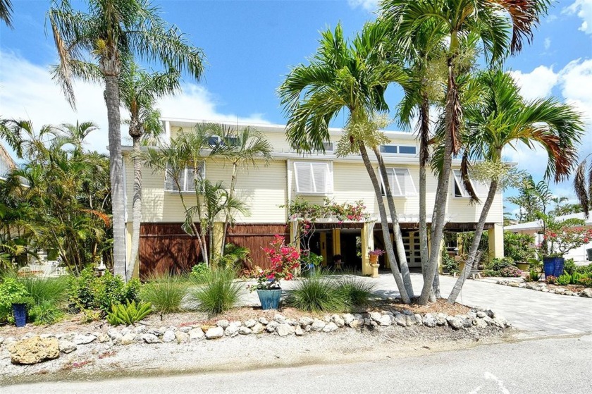 Welcome to Bougain Villa, your Tropical Island Oasis on a deep - Beach Home for sale in Longboat Key, Florida on Beachhouse.com