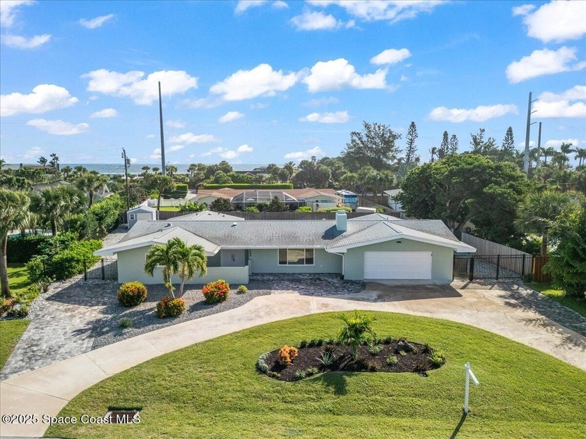Discover this beautifully renovated pool home situated on .37 - Beach Home for sale in Melbourne Beach, Florida on Beachhouse.com