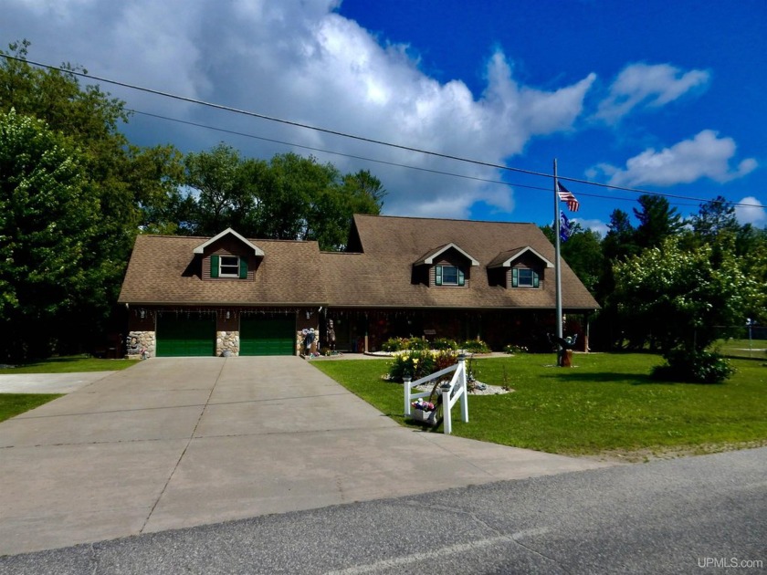 **Stunning Waterfront Home on Indian River**   Experience the - Beach Home for sale in Manistique, Michigan on Beachhouse.com