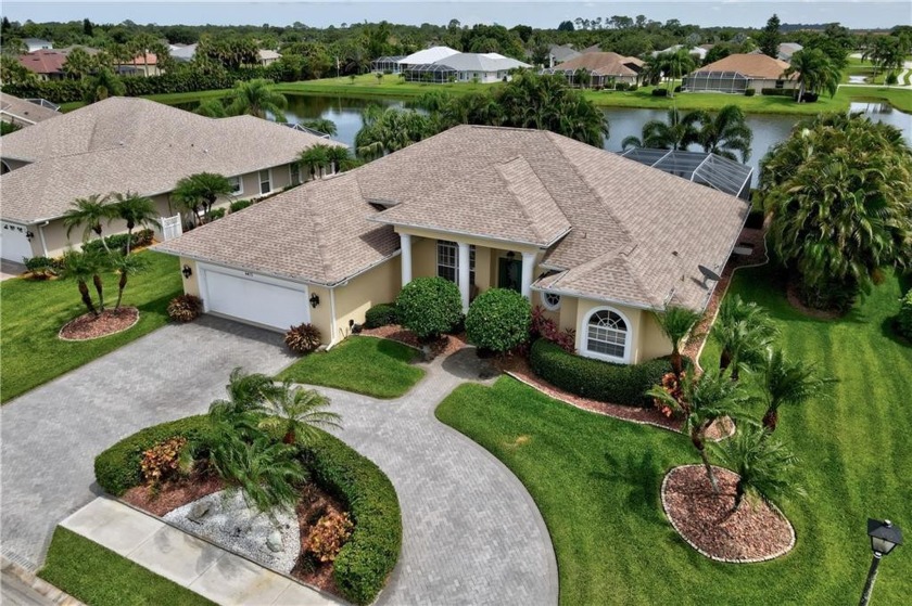 A must-see breathtaking lakefront home. Large, screened pool/spa - Beach Home for sale in Vero Beach, Florida on Beachhouse.com