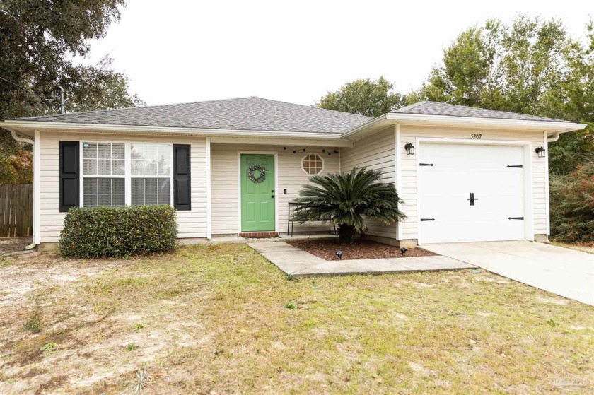 This cozy little home, tucked away in a quiet cul-de-sac in Gulf - Beach Home for sale in Gulf Breeze, Florida on Beachhouse.com