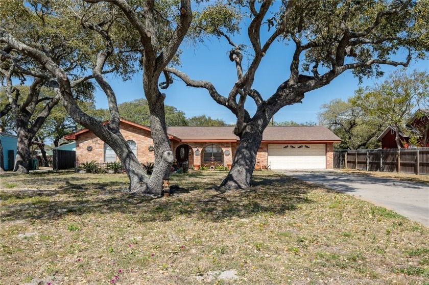 Nestled beneath the shade of sprawling oak trees over three - Beach Home for sale in Aransas Pass, Texas on Beachhouse.com