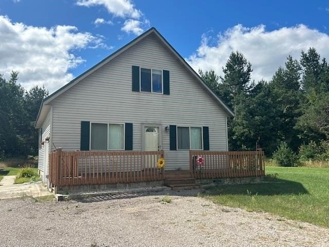 Charming 3-Bedroom, 2-Bath Home on 2.96 Acres. Enjoy privacy and - Beach Home for sale in Trout Lake, Michigan on Beachhouse.com