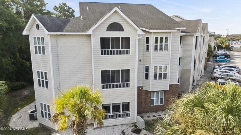 Step into this bright and airy 2 bed 2 bath end unit with - Beach Condo for sale in Carolina Beach, North Carolina on Beachhouse.com