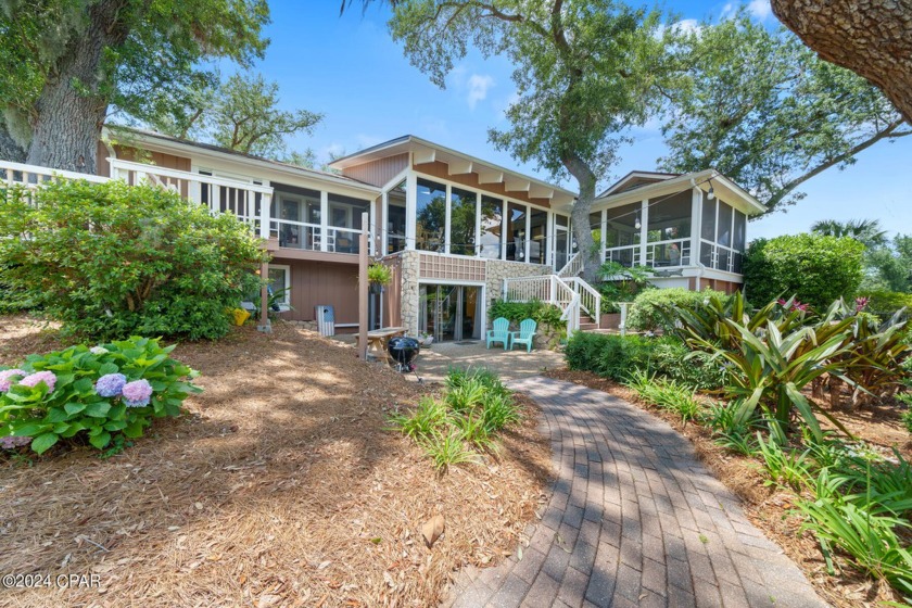 Unique WATERFRONT home in the heart of The Cove! This property - Beach Home for sale in Panama City, Florida on Beachhouse.com