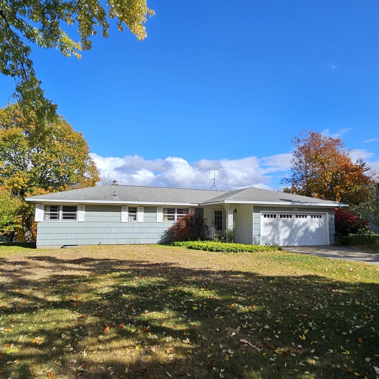 3 bedroom 2 bathroom walk-out ranch with 100 feet on Mona Lake - Beach Home for sale in Norton Shores, Michigan on Beachhouse.com