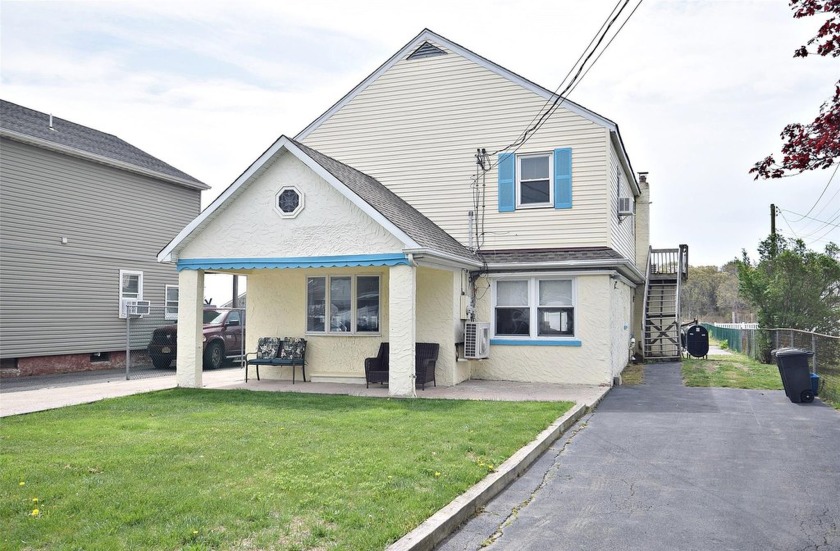 This 2200 square foot waterfront property  is a rare find! - Beach Home for sale in Mastic Beach, New York on Beachhouse.com
