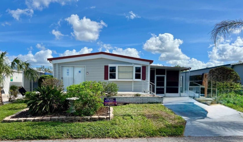 Nestled in the serene Bay Indies Resort Community, this - Beach Home for sale in Venice, Florida on Beachhouse.com