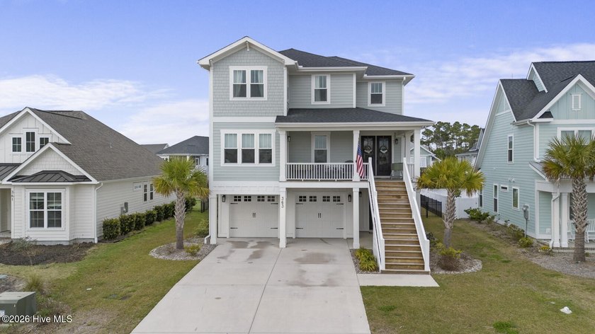 Welcome to this stunning three-story home in the sought-after - Beach Home for sale in Holly Ridge, North Carolina on Beachhouse.com