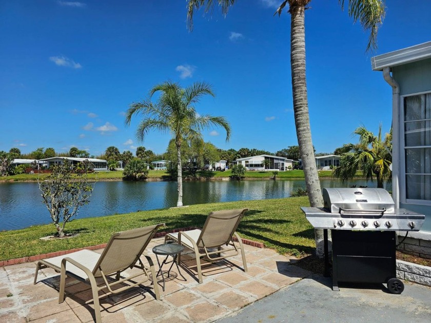 This fully updated 2-bedroom, 2-bath home boasts stunning lake - Beach Home for sale in Vero Beach, Florida on Beachhouse.com