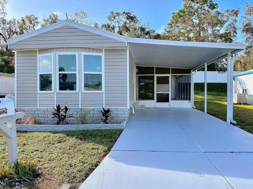 Come see this beautifully renovated mobile home in East Lake - Beach Home for sale in Hudson, Florida on Beachhouse.com