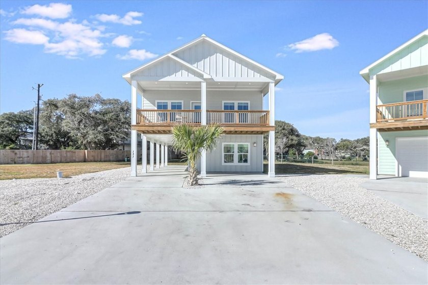 This 5 bedroom 4 bath home is full of shiplap and coastal charm! - Beach Home for sale in Fulton, Texas on Beachhouse.com