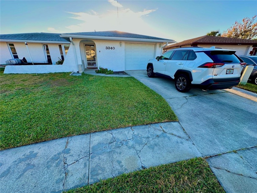 One or more photo(s) has been virtually staged. this charming - Beach Home for sale in Holiday, Florida on Beachhouse.com