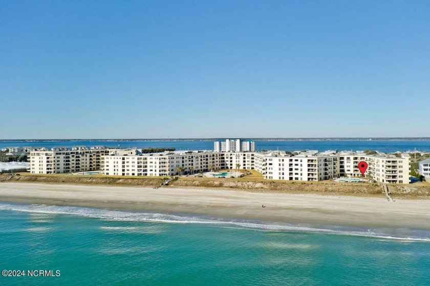 Experience the ultimate in coastal living with this stunning - Beach Condo for sale in Indian Beach, North Carolina on Beachhouse.com