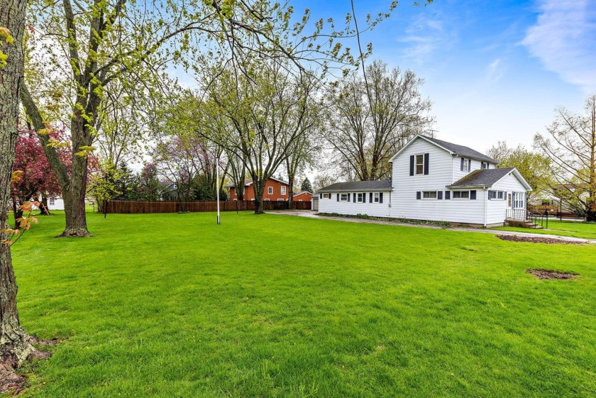 SOLID AND SPACIOUS home, double lot and huge garage! Only 10 - Beach Home for sale in Three Oaks, Michigan on Beachhouse.com