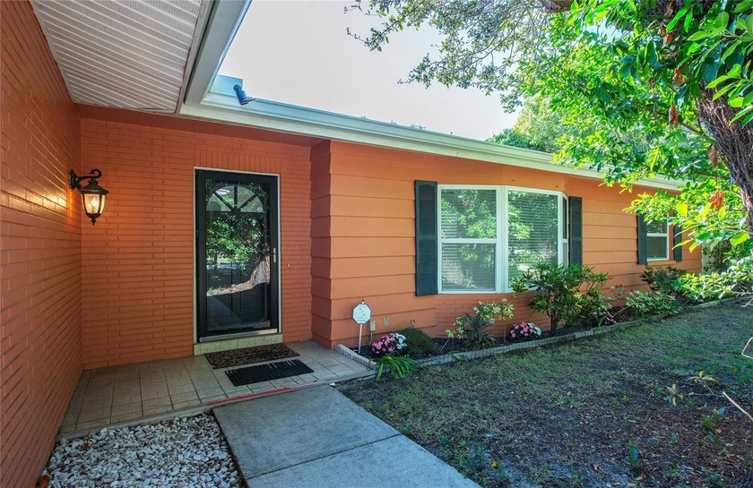 Nestled in the serene and well-established Leisure Acres - Beach Home for sale in Clearwater, Florida on Beachhouse.com