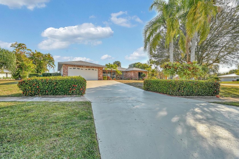 Welcome to this beautifully remodeled home situated on a rare - Beach Home for sale in Port Saint Lucie, Florida on Beachhouse.com