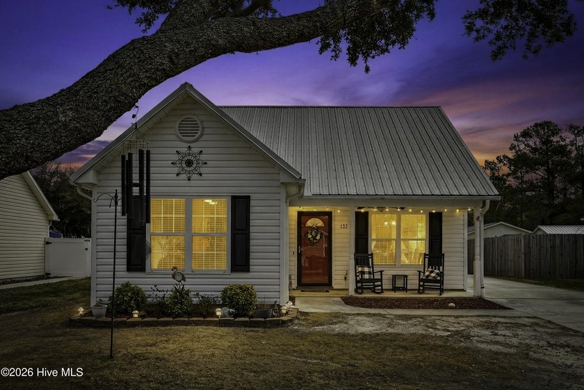 Enjoy the rhythm of coastal living in this well-maintained - Beach Home for sale in Oak Island, North Carolina on Beachhouse.com