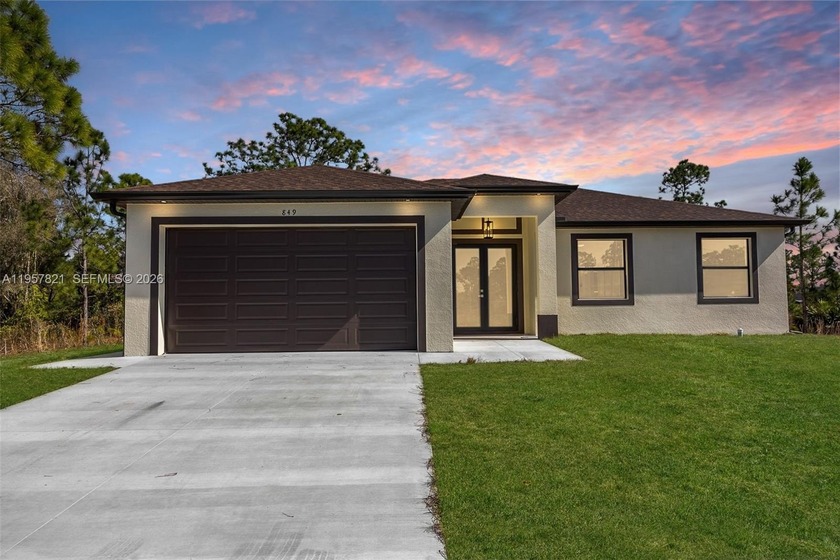 This brand-new construction 2026 home is complete and move-in - Beach Home for sale in Lehigh Acres, Florida on Beachhouse.com
