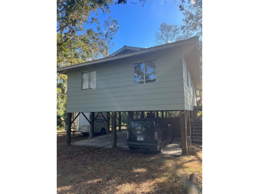 Lake Tarpon Waterfront ... access with boat ramp in front of the - Beach Home for sale in Tarpon Springs, Florida on Beachhouse.com