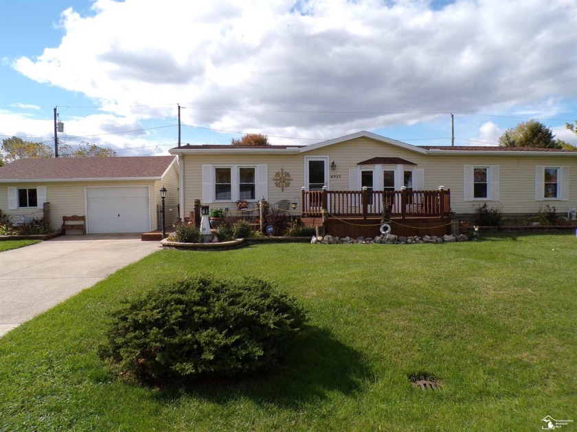 Discover this charming ranch in the desirable Brest Bay Grove - Beach Home for sale in Newport, Michigan on Beachhouse.com