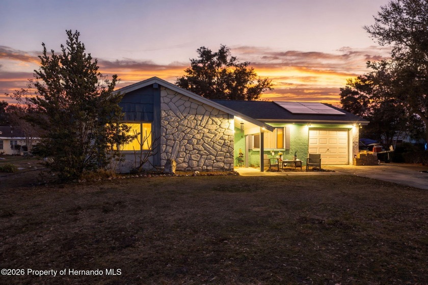 This charming 3-bedroom, 2-bathroom home with a 1-car garage - Beach Home for sale in Holiday, Florida on Beachhouse.com